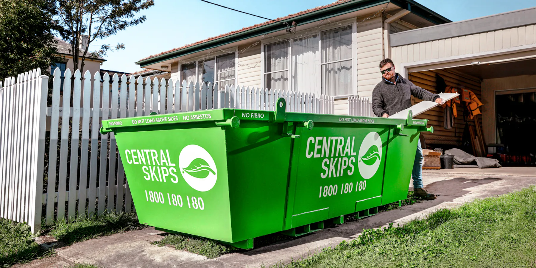 residential-skip-hire loading-skip-bin-2000x1000-1